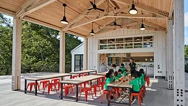 Students enjoy outdoor learning spaces in a classroom setting