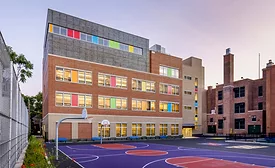 a school's colorful design, showing outdoor basketball courts.