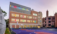 a school's colorful design, showing outdoor basketball courts.