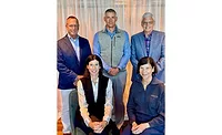 CRS Board Members sit together 