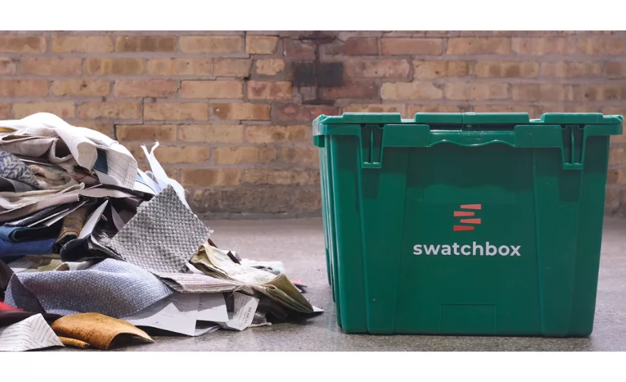 swatches in a pile outside of a Swatchbox