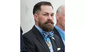 Clint Romesha Headshot