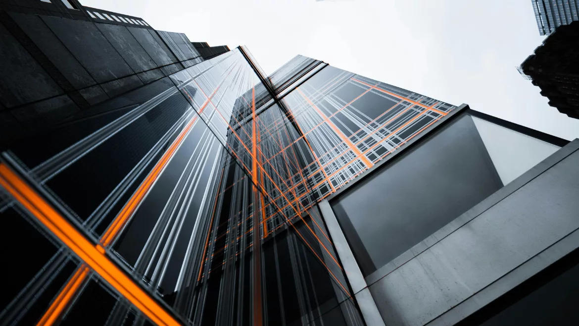 low-angle-photo-of-high-rise-buildings-under-white-sky