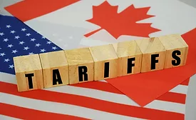 the word tariffs with a canadian and american flag
