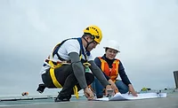 S-5! works on a roof in Mexico