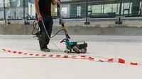 robot welder sealing tape on a roof