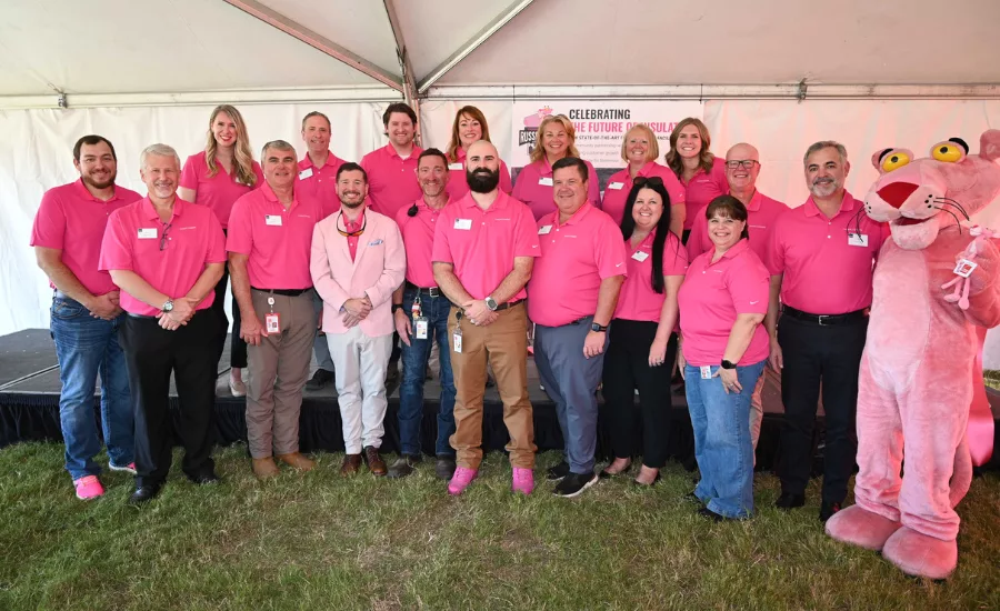 Owens Corning team members at a ribbon cutting in Arkansas