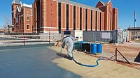 A spray-on polyurea system from Henry is being used to waterproof a concrete deck in Baltimore. 