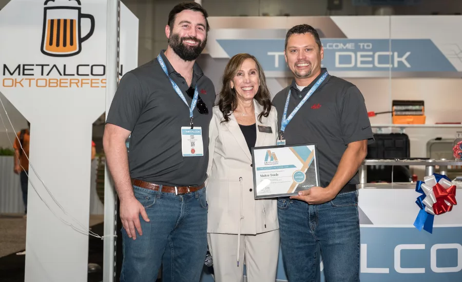 VP of Trade Shows at METALCON presents award to Malco Tools