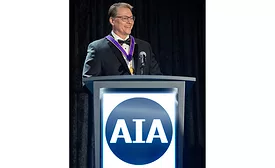 Illya Azaroff at AIA podium