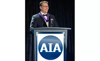 Illya Azaroff at AIA podium