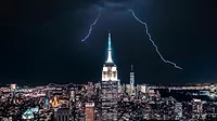 new york city.png NYC skyline at night with lightning in the background