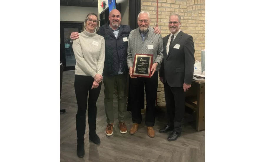From left to right, Phoebe McCorkindale, Ben Kweton and Phil Kweton of Sheet Metal Supply, along with Kevin Waldenstrom, a Grayslake Villate Trustee.