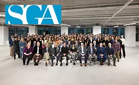 SGA employees pose for a picture, with SGA logo 