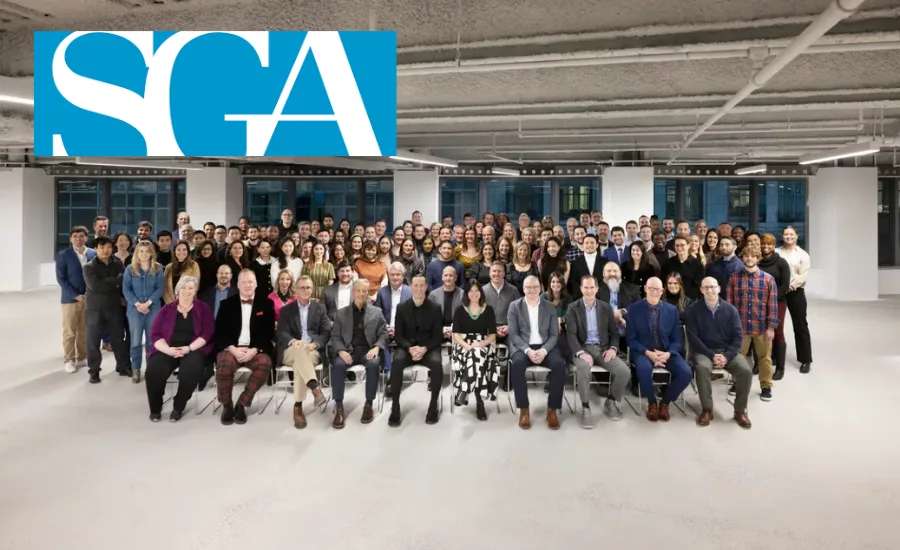 SGA employees pose for a picture, with SGA logo 
