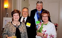 CaroleAndHenryTaylor_SteveAndLizRennekamp attend a party in 2012
