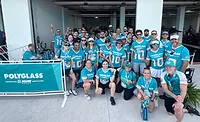 Polyglass employees pose for a picture at Dolphins Cancer Challenge 