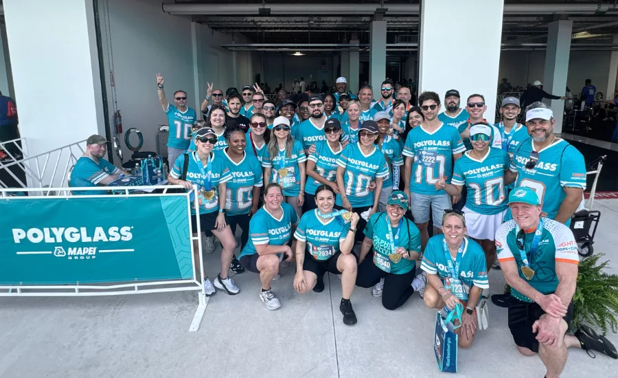 Polyglass employees pose for a picture at Dolphins Cancer Challenge 