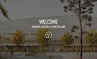 Vectorworks logo infront of a building with autumn trees