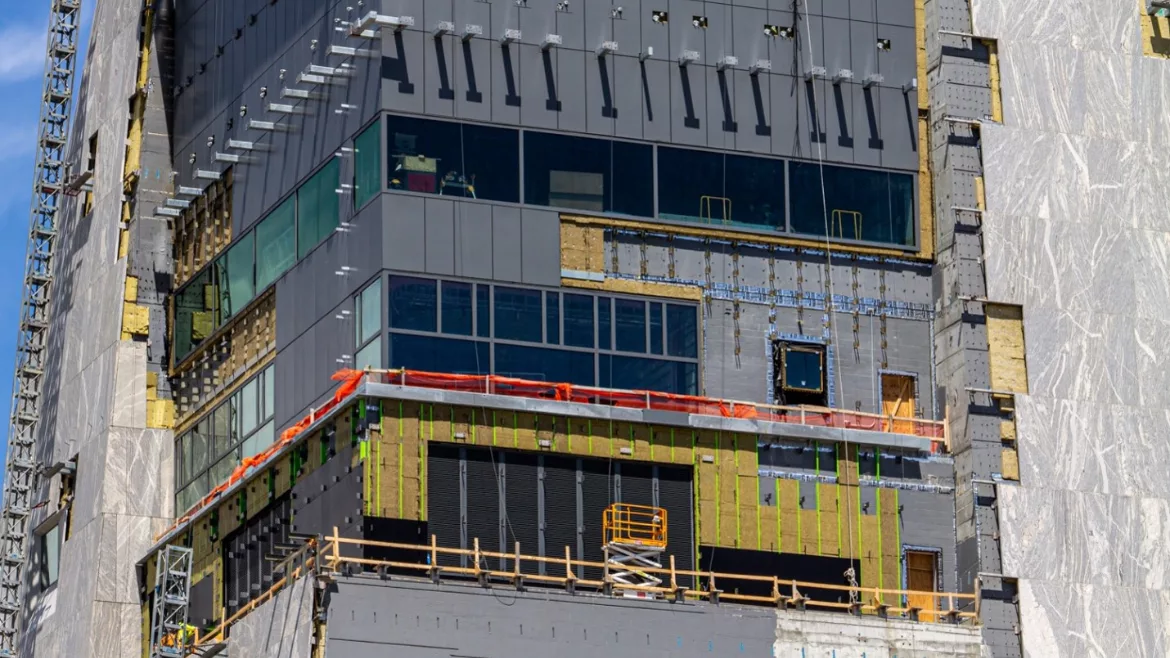 insulation being installed on the Obama Tower