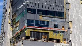 insulation being installed on the Obama Tower