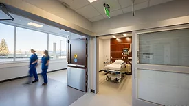 Patient room doors with flexible privacy features widens possible uses within these spaces and improves patient comfort