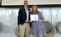 Gale Associates Managing Partner Steven Marshall and Director of Human Resources Lynette Young accepting the 2026 Wage Equity Impact Award