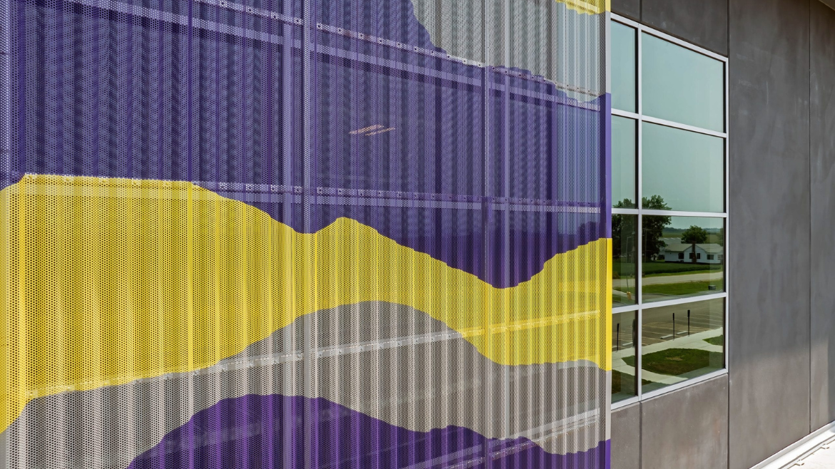 perforated screen close up in purple and yellow design