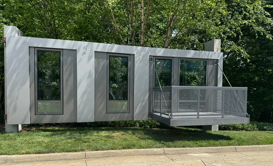 The high strength-to-weight ratio of this structural composite panel allows a balcony unit to be suspended from the panel itself.