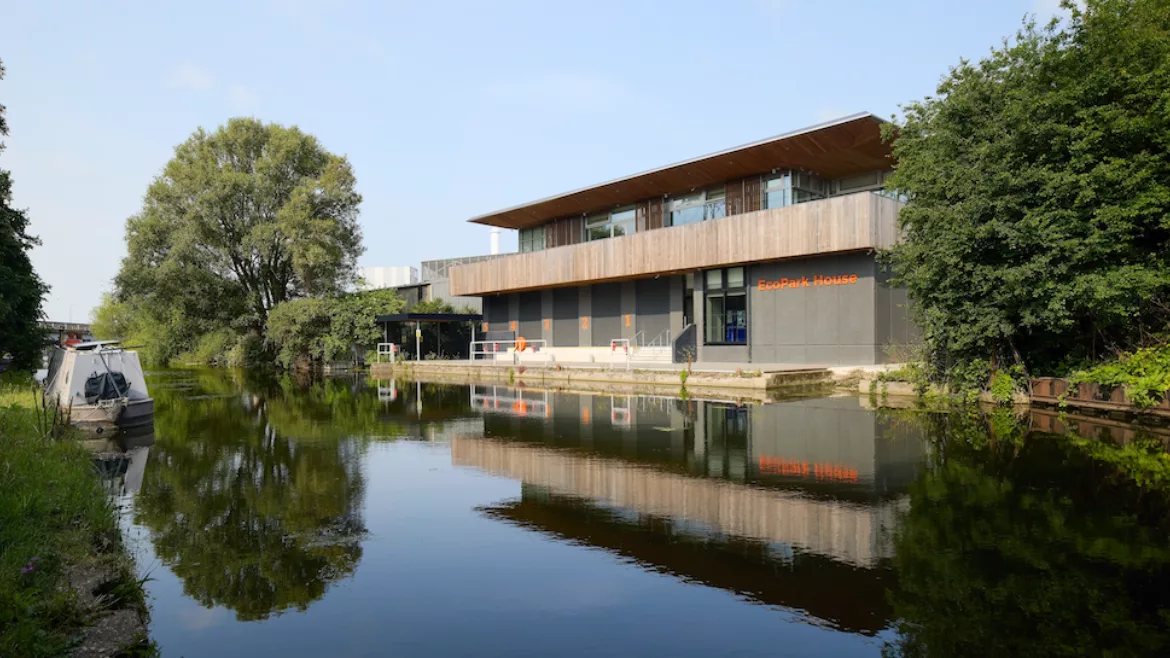 Grimshaw_EcoPark House_NLHPP_London exterior sits on the water