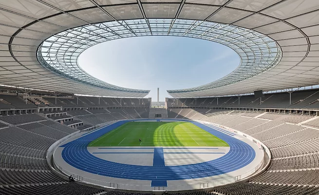 inside of an empty soccer stadium