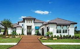 residential house has white exterior walls and terra cotta