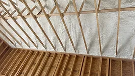 Open vs. closed cell foam in an attic