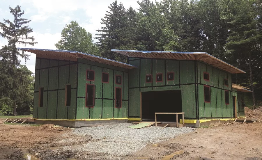 Construction view of a project based on passive house principles, showing the zip system.