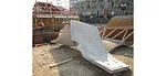 This mockup revealed that self-consolidating concrete would not be viable to produce the tight edge details and reveal desired.