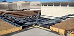 Transition detailing for the continuity of the air and vapor barrier system at the roof overhangs.